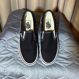 Vans Classic Black and White Slip-Ons